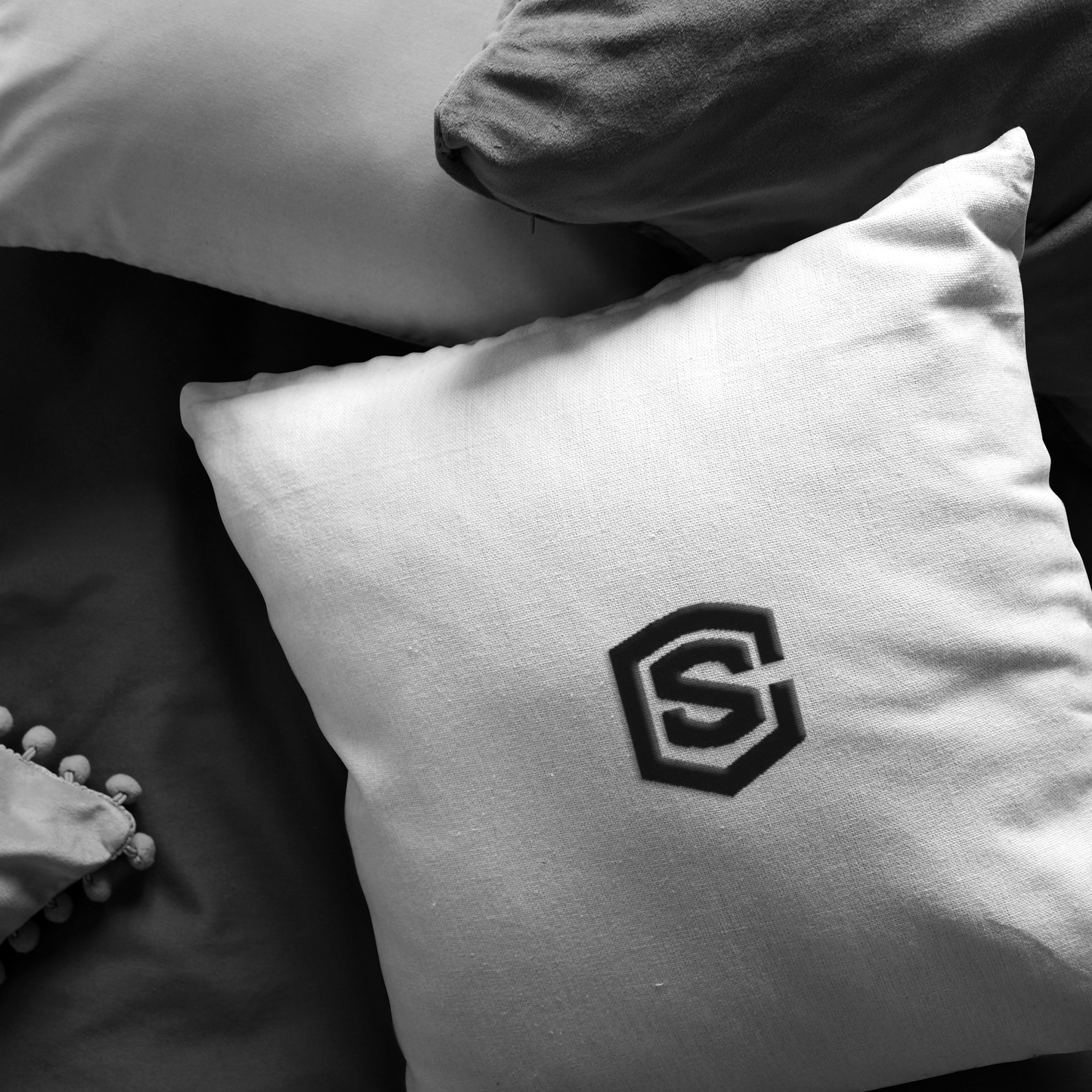 WHITE PILLOW BLACK LOGO